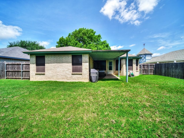 3717 Fairhaven Dr, Fort Worth, TX 76123 - back of property featuring a fenced backyard, brick siding, and a patio