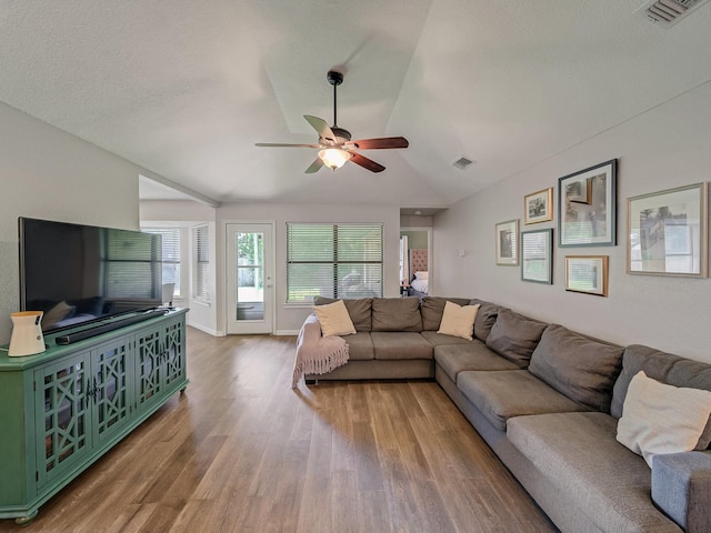 3717 Fairhaven Dr, Fort Worth, TX 76123 - living room with lofted ceiling, wood finished floors, and a ceiling fan