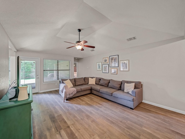 3717 Fairhaven Dr, Fort Worth, TX 76123 - living room featuring wood finished floors, ceiling fan, and lofted ceiling