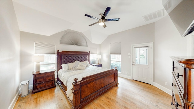 3009 Wood Trl, Flower Mound, TX 75022 - bedroom featuring multiple windows, vaulted ceiling, light wood finished floors, and a ceiling fan