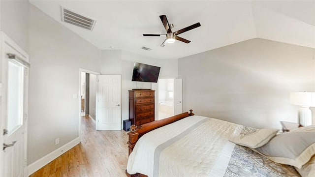 3009 Wood Trl, Flower Mound, TX 75022 - bedroom featuring light wood-style floors, vaulted ceiling, and ceiling fan