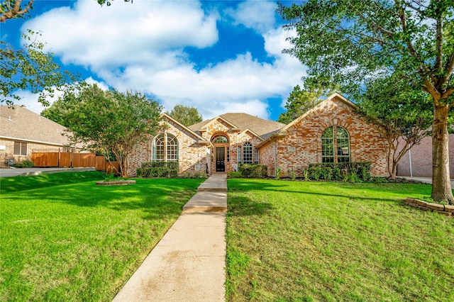 3009 Wood Trl, Flower Mound, TX 75022 - view of front facade featuring brick siding and a shingled roof