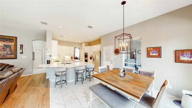 3009 Wood Trl, Flower Mound, TX 75022 - dining space with a chandelier and recessed lighting