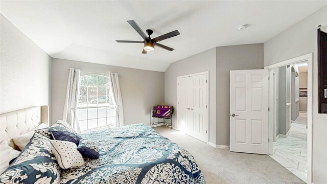 3009 Wood Trl, Flower Mound, TX 75022 - bedroom with vaulted ceiling, a ceiling fan, light carpet, and a closet