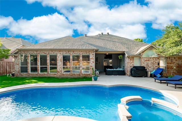 3009 Wood Trl, Flower Mound, TX 75022 - view of pool featuring a patio, a pool with connected hot tub, and grilling area