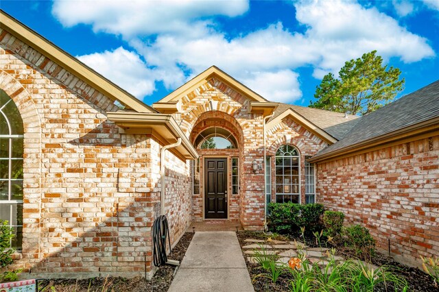 3009 Wood Trl, Flower Mound, TX 75022 - doorway to property with brick siding and a shingled roof