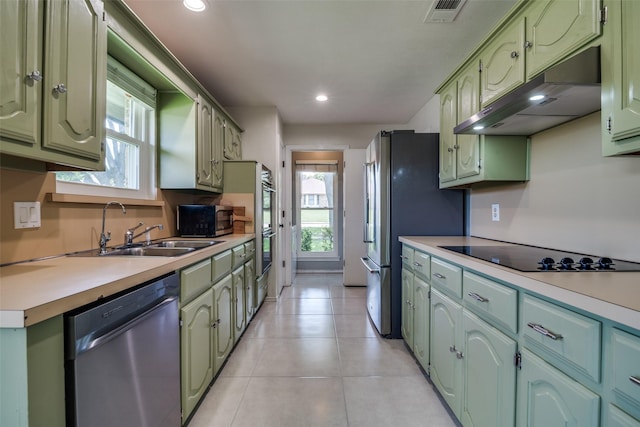 913 Lake Meadows Dr, Rockwall, TX 75087 - kitchen with stainless steel appliances, green cabinets, and recessed lighting