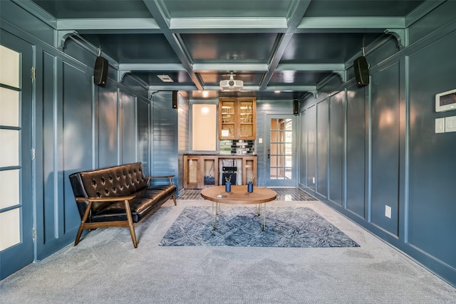 913 Lake Meadows Dr, Rockwall, TX 75087 - living area with a decorative wall, carpet floors, coffered ceiling, beam ceiling, and crown molding