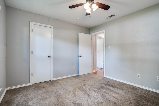 913 Lake Meadows Dr, Rockwall, TX 75087 - unfurnished bedroom with carpet and ceiling fan