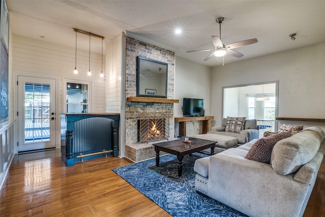 913 Lake Meadows Dr, Rockwall, TX 75087 - living area with wood finished floors, plenty of natural light, ceiling fan, a fireplace, and recessed lighting