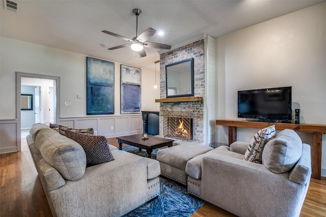 913 Lake Meadows Dr, Rockwall, TX 75087 - living area featuring a ceiling fan, a brick fireplace, wood finished floors, and recessed lighting