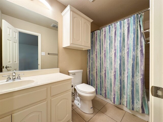 14001 Zippo Way, Fort Worth, TX 76052 - full bathroom with tile patterned floors, vanity, a shower with curtain, and a textured ceiling