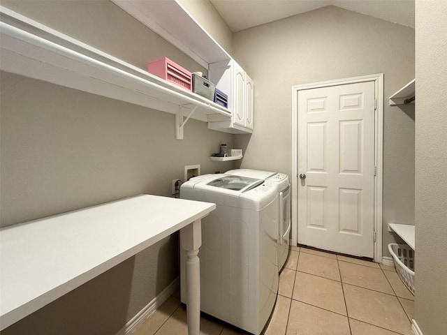14001 Zippo Way, Fort Worth, TX 76052 - laundry area featuring cabinet space, separate washer and dryer, and light tile patterned floors