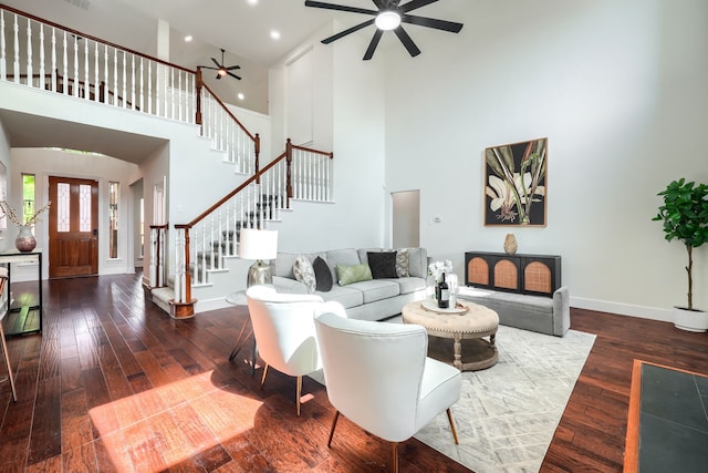 3609 Whitehaven Dr, Plano, TX 75093 - living room featuring ceiling fan, a towering ceiling, stairway, wood-type flooring, and recessed lighting