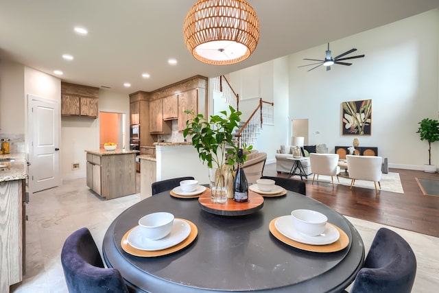 3609 Whitehaven Dr, Plano, TX 75093 - dining room with stairway, recessed lighting, a ceiling fan, and a towering ceiling