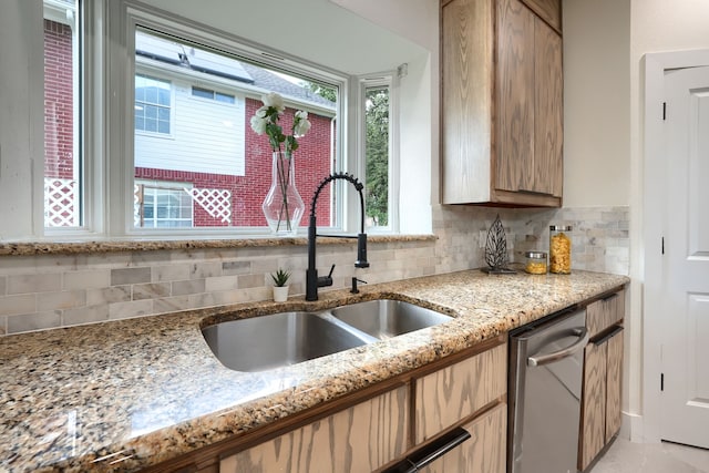 3609 Whitehaven Dr, Plano, TX 75093 - kitchen featuring backsplash, light brown cabinets, light stone counters, and dishwasher