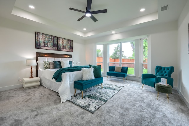 3609 Whitehaven Dr, Plano, TX 75093 - carpeted bedroom with a tray ceiling, recessed lighting, and ceiling fan