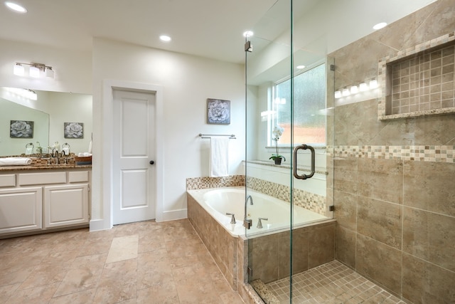 3609 Whitehaven Dr, Plano, TX 75093 - bathroom with a bath, a stall shower, vanity, and recessed lighting