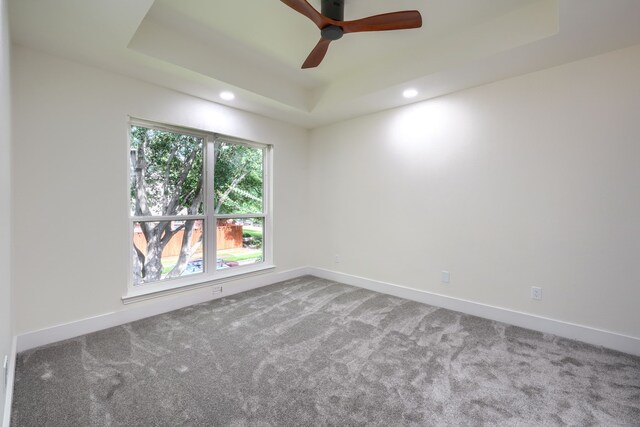 3609 Whitehaven Dr, Plano, TX 75093 - unfurnished room featuring a raised ceiling, carpet flooring, a ceiling fan, and recessed lighting