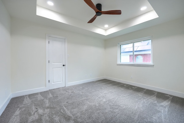 3609 Whitehaven Dr, Plano, TX 75093 - carpeted spare room with a tray ceiling, a ceiling fan, and recessed lighting