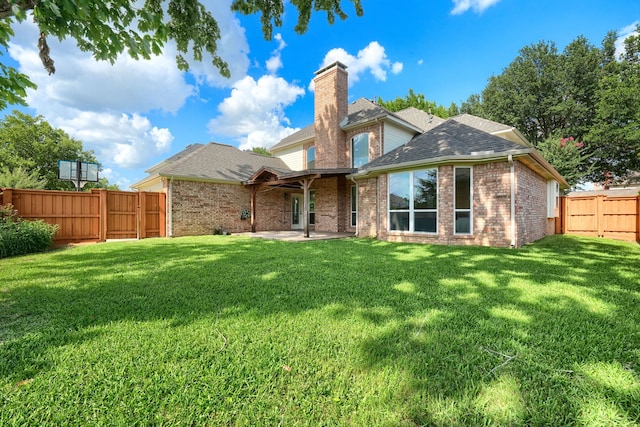 3609 Whitehaven Dr, Plano, TX 75093 - rear view of house with a gate, a fenced backyard, a patio area, and a chimney