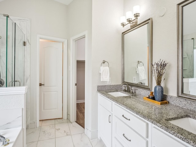 5117 Forest Lawn Dr, Mckinney, TX 75071 - full bath with a marble finish shower, marble finish flooring, double vanity, and a spacious closet