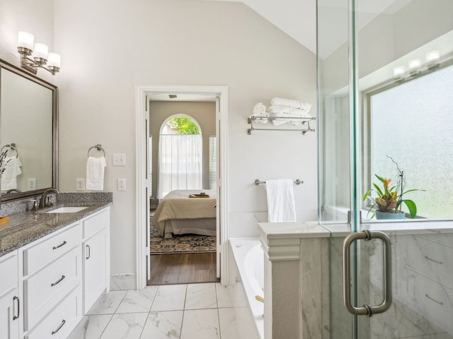 5117 Forest Lawn Dr, Mckinney, TX 75071 - full bath featuring vanity, a bath, marble finish floors, lofted ceiling, and ensuite bath
