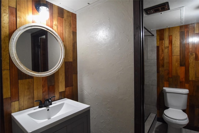 1704 Baird Farm Cir Unit 4207, Arlington, TX 76006 - bathroom with wooden walls, vanity, and a shower