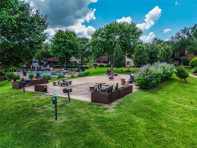 1704 Baird Farm Cir Unit 4207, Arlington, TX 76006 - view of property's community featuring a lawn and a patio