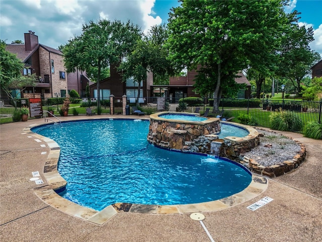 1704 Baird Farm Cir Unit 4207, Arlington, TX 76006 - view of pool featuring a pool with connected hot tub