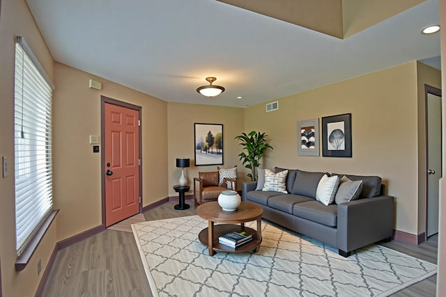 1704 Baird Farm Cir Unit 4207, Arlington, TX 76006 - living room with healthy amount of natural light, wood finished floors, and recessed lighting