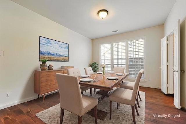1021 Springtown St, Forney, TX 75126 - dining area with baseboards and dark wood finished floors