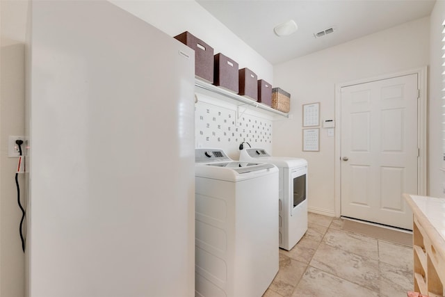 1021 Springtown St, Forney, TX 75126 - laundry room featuring separate washer and dryer
