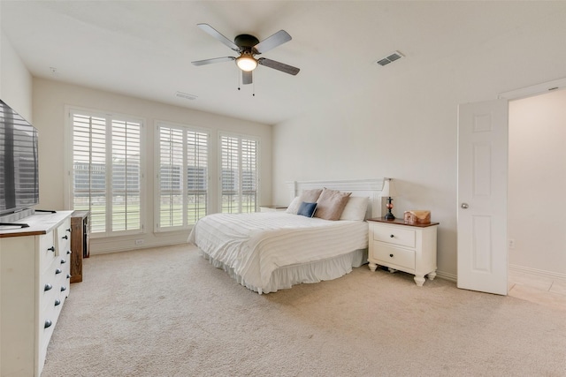 1021 Springtown St, Forney, TX 75126 - bedroom with multiple windows, light carpet, and a ceiling fan