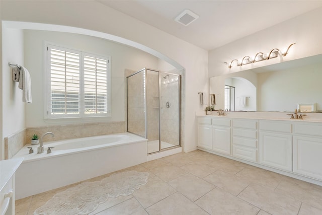 1021 Springtown St, Forney, TX 75126 - full bath with double vanity, a bath, a stall shower, and tile patterned flooring