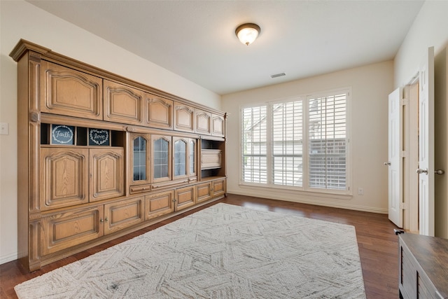1021 Springtown St, Forney, TX 75126 - interior space featuring dark wood-type flooring and baseboards