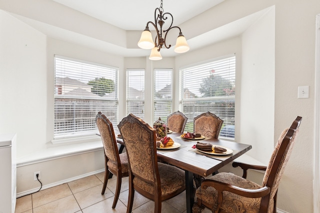 8501 Viridian Ln, Fort Worth, TX 76123 - dining room with a chandelier and light tile patterned floors