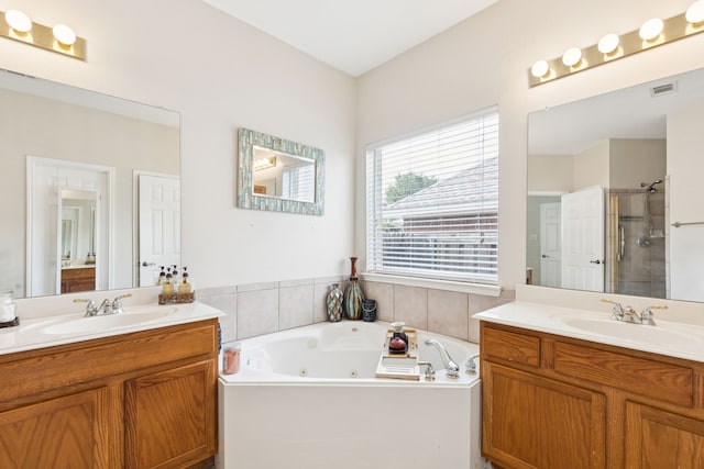 8501 Viridian Ln, Fort Worth, TX 76123 - full bath featuring a stall shower, two vanities, and a whirlpool tub