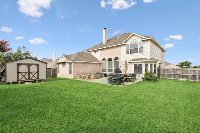 8501 Viridian Ln, Fort Worth, TX 76123 - rear view of property with a storage shed, a patio area, a fenced backyard, and brick siding