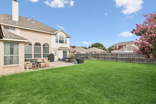 8501 Viridian Ln, Fort Worth, TX 76123 - fenced backyard with a patio