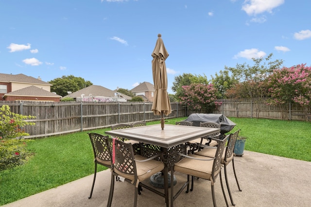 8501 Viridian Ln, Fort Worth, TX 76123 - fenced backyard featuring a patio area and outdoor dining space