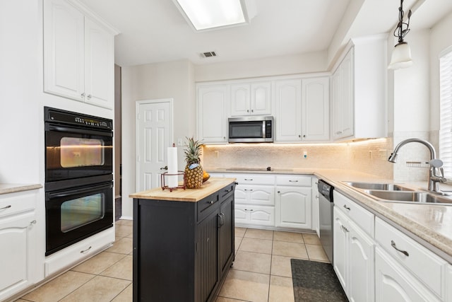 8501 Viridian Ln, Fort Worth, TX 76123 - kitchen featuring appliances with stainless steel finishes, butcher block countertops, and white cabinets