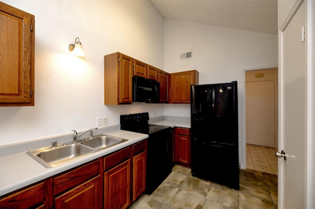 308 Crowe Dr, Euless, TX 76040 - kitchen with black appliances, high vaulted ceiling, light countertops, and light tile patterned floors