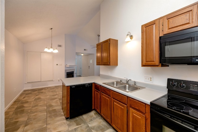 308 Crowe Dr, Euless, TX 76040 - kitchen with black appliances, a peninsula, light countertops, brown cabinets, and high vaulted ceiling
