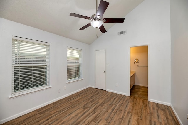 308 Crowe Dr, Euless, TX 76040 - unfurnished bedroom with wood finished floors, ceiling fan, and high vaulted ceiling