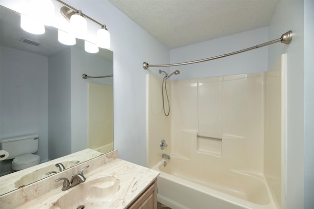 308 Crowe Dr, Euless, TX 76040 - full bathroom featuring tub / shower combination, vanity, and a textured ceiling