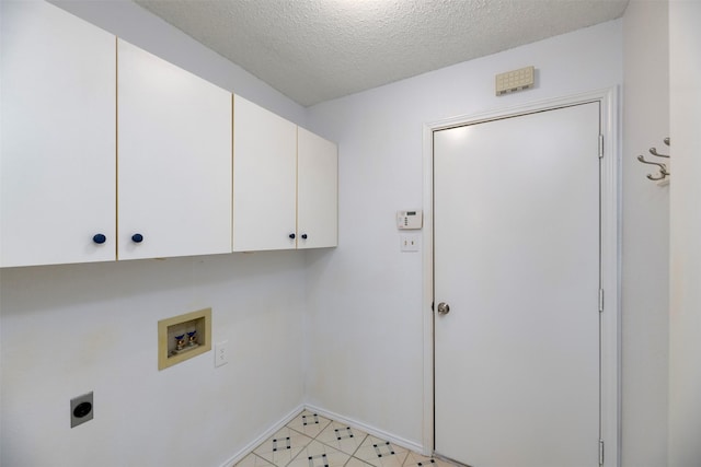 308 Crowe Dr, Euless, TX 76040 - laundry area featuring electric dryer hookup, cabinet space, hookup for a washing machine, and a textured ceiling