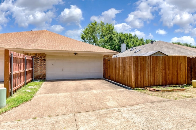 308 Crowe Dr, Euless, TX 76040 - garage featuring concrete driveway