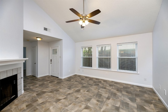 308 Crowe Dr, Euless, TX 76040 - unfurnished living room with ceiling fan, high vaulted ceiling, and a tile fireplace