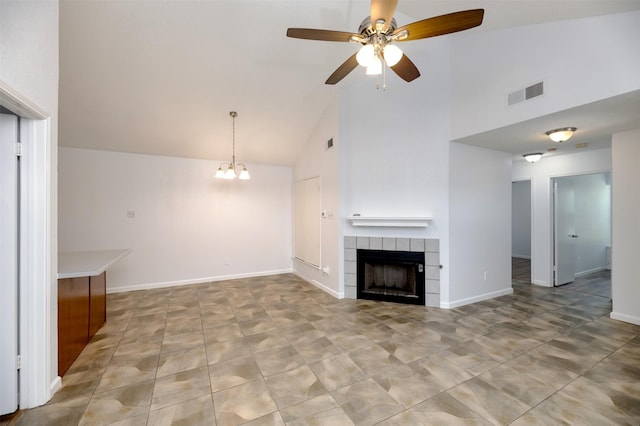 308 Crowe Dr, Euless, TX 76040 - unfurnished living room with high vaulted ceiling, a tiled fireplace, a ceiling fan, and light tile patterned floors
